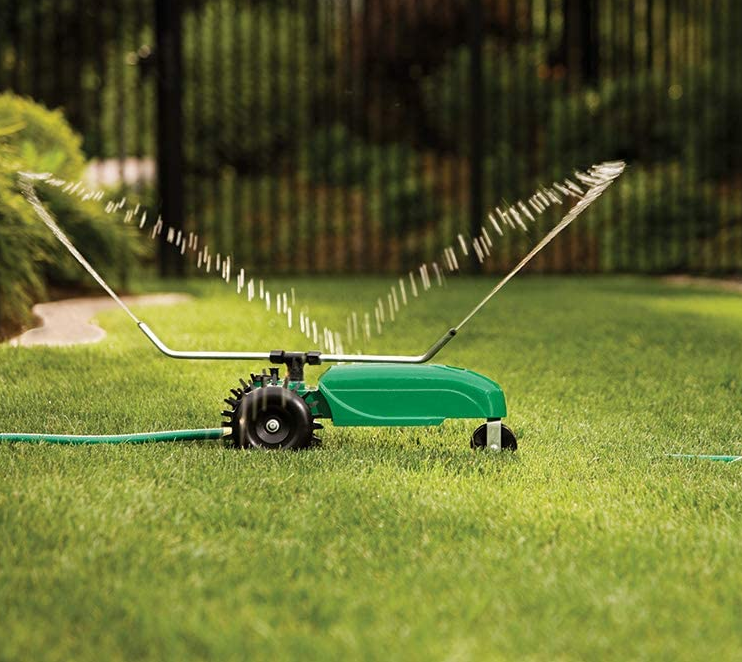 Self Propelled Traveling Sprinkler Tractor Yard Lawn Grass Water Spray Train