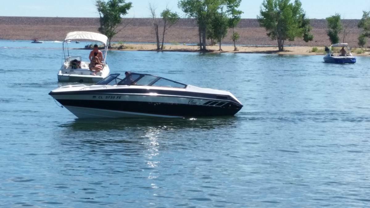 19' Classic Yacht open Bow with accessories and a custom tandem axle trailer