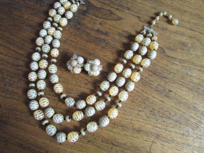 Vintage carved Hong Kong triple strand necklace & clip earring set