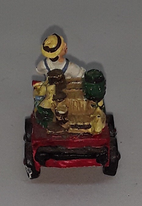 Painted Cast Metal Man on Wagon 95' IRS