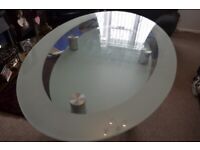 Glass oval dining table