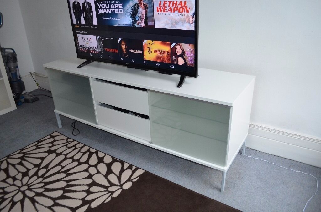 IKEA TV stand cabinet with two sliding doors and drawers ...