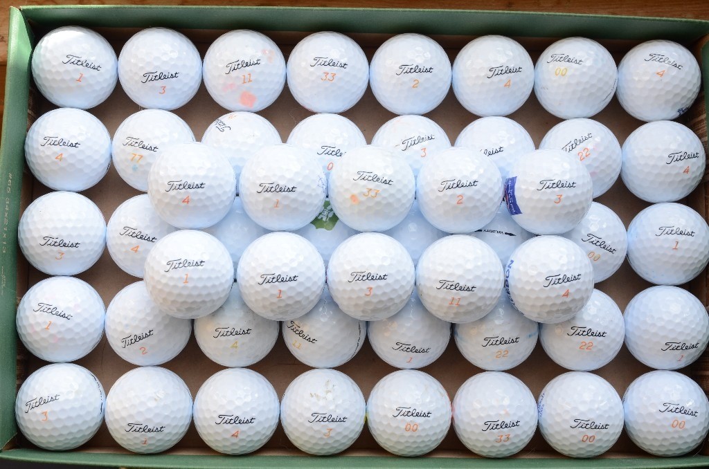 50 used Titleist Velocity golf balls in casual game/practice condition