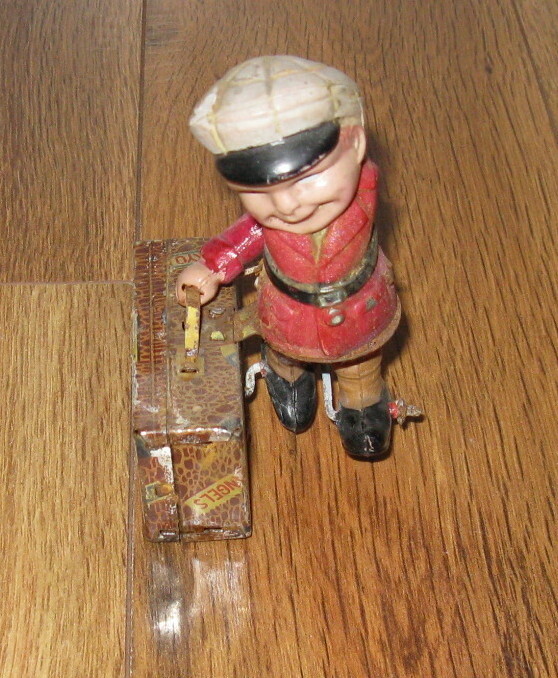 VTG Wind Up C.K Trademark Man Suitcase Walking Litho Tin