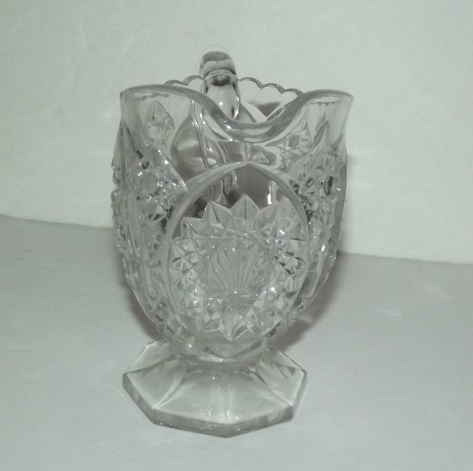NEAT UNMARKED DECORATICE GLASS PITCHER WITH SEASHELL DESIGN
