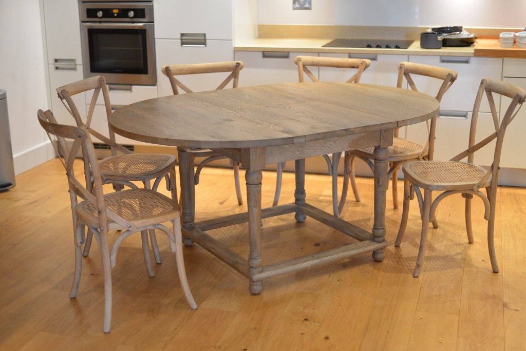 OKA extending dining table and 6 Camargue chairs (all in oak) in