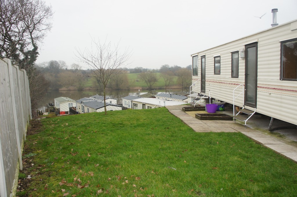 2002, 2 Bedroom Caravan at Lakeside Leisure for sale. Private area with