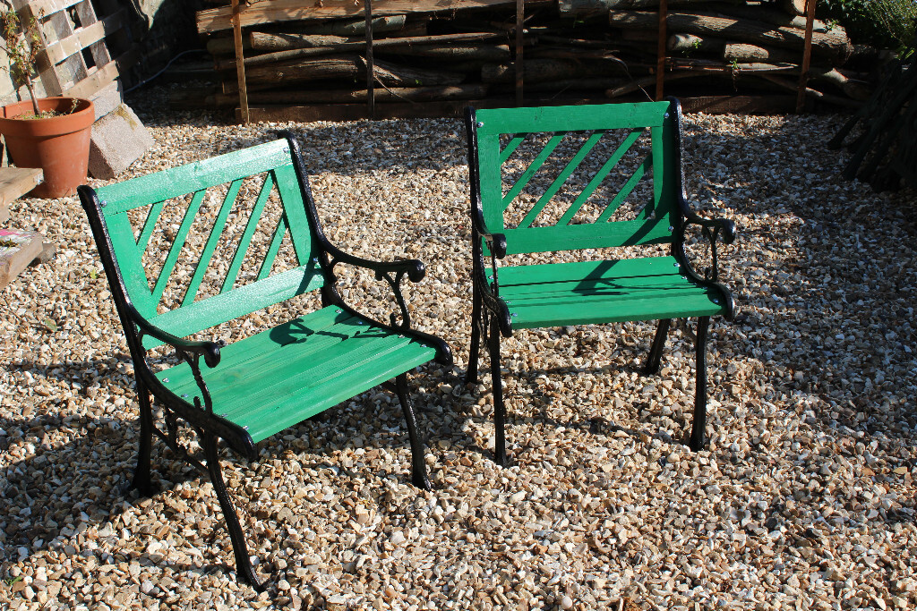 A pair of restored vintage garden chairs in Glastonbury, Somerset
