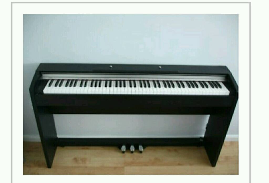 Digital piano Casio px-730 pristine condition - built in cover