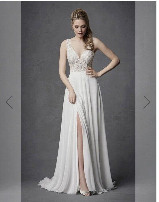 Wedding dress - Unworn - size 14 | in Roseburn, Edinburgh | Gumtree