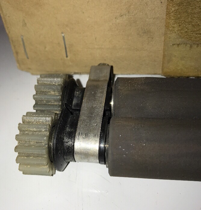 Roller Set with Gears on the end Found In Newspaper office NO CLUE what it is!