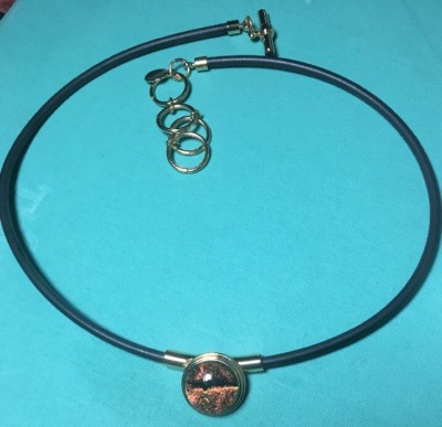 ZERO GRAVITY brown gold dichroic glass medallion on rubber necklace; adjustable 