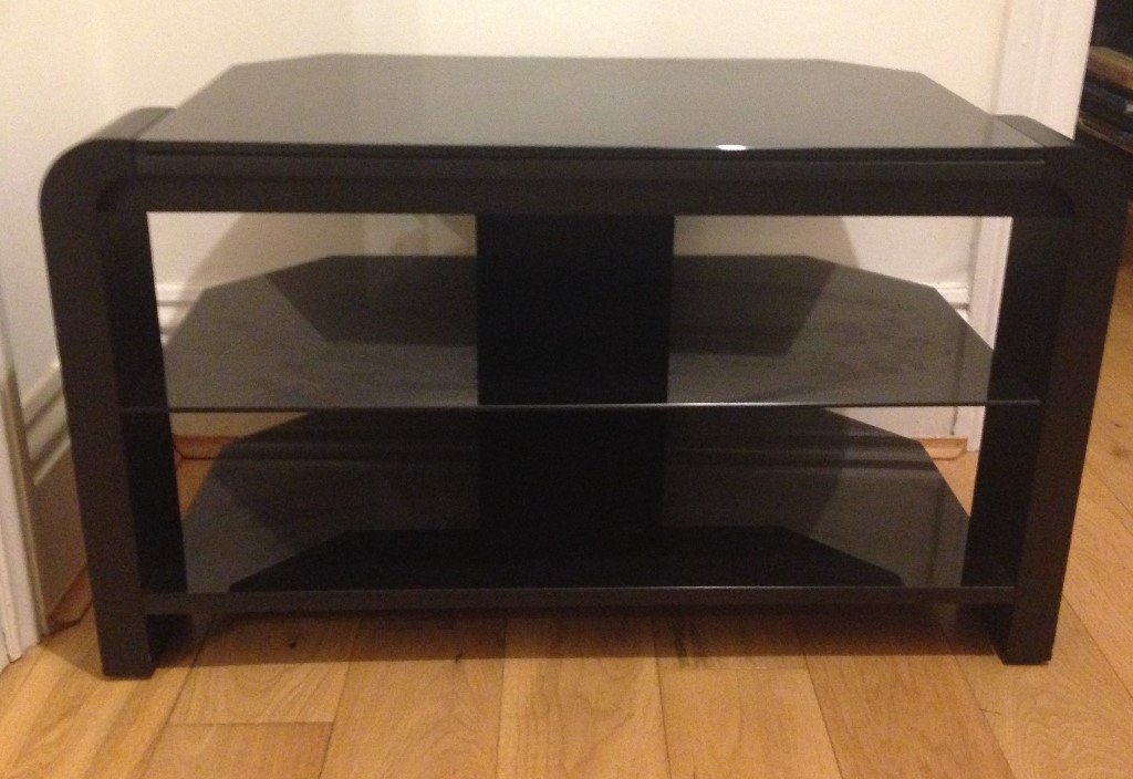 John Lewis black TV stand with smoked glass shelves in Broadstone
