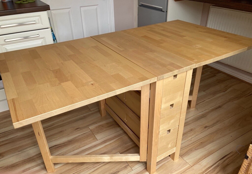 IKEA solid wood double drop leaf dining table in Normanton, West