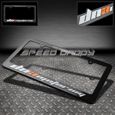 РАМКА НОМЕРНОГО ЗНАКА DNA MOTORING С ГРАВИРОВКОЙ ПО СТАНДАРТУ США/КАНАДЫ/ГОНОЧНАЯ СТОЙКА ЧЕРНОГО ЦВЕТА