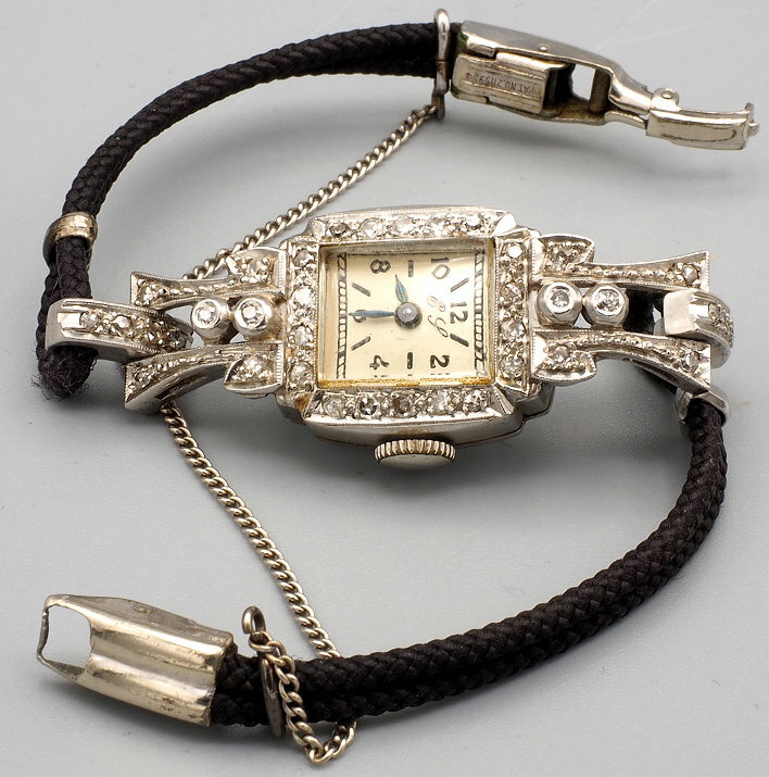 Vintage Watch by Geneva Watch Co. 17Jewels, 38 Diamonds Platinum Case Swiss Runs