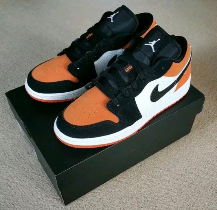 neon orange and black jordans