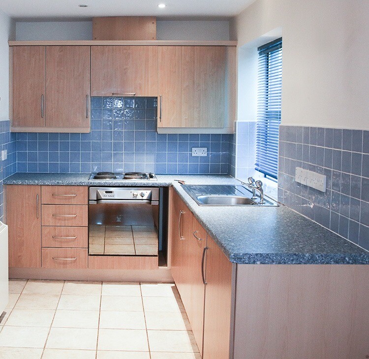 Kitchen units (built in). Light wood (beech effect) base and wall units