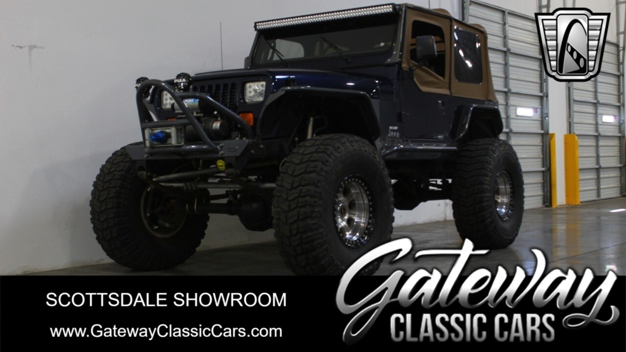 Blue 1995 Jeep Wrangler  4.0L H.O. I6 5-Speed Manual Available Now!