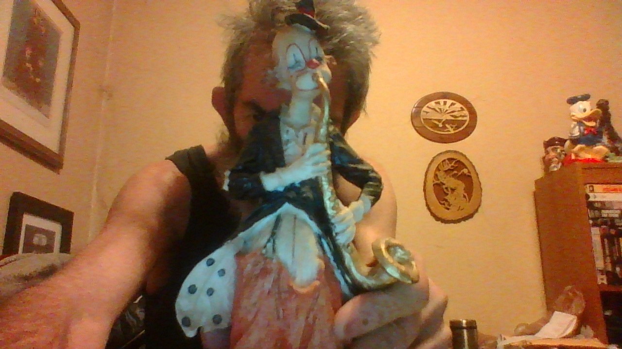 CLOWN FIGURINE 11 inch ceramic on wood base saxaphone player perfect