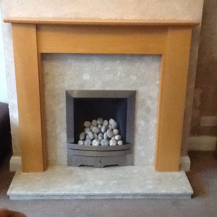Real flame gas fire with pebbles . Comes complete with marble hearth