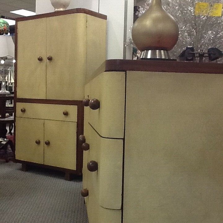 TWO 1938 ART DECO ASYMMETRICAL WALNUT CABINET WITH PARCHMENT FACINGS