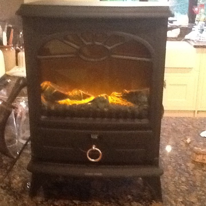 Log Burner Affect Heater. Moving mode in door. Fan heater under. in