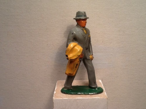 Vintage Barclay lead man in gray suit. 3