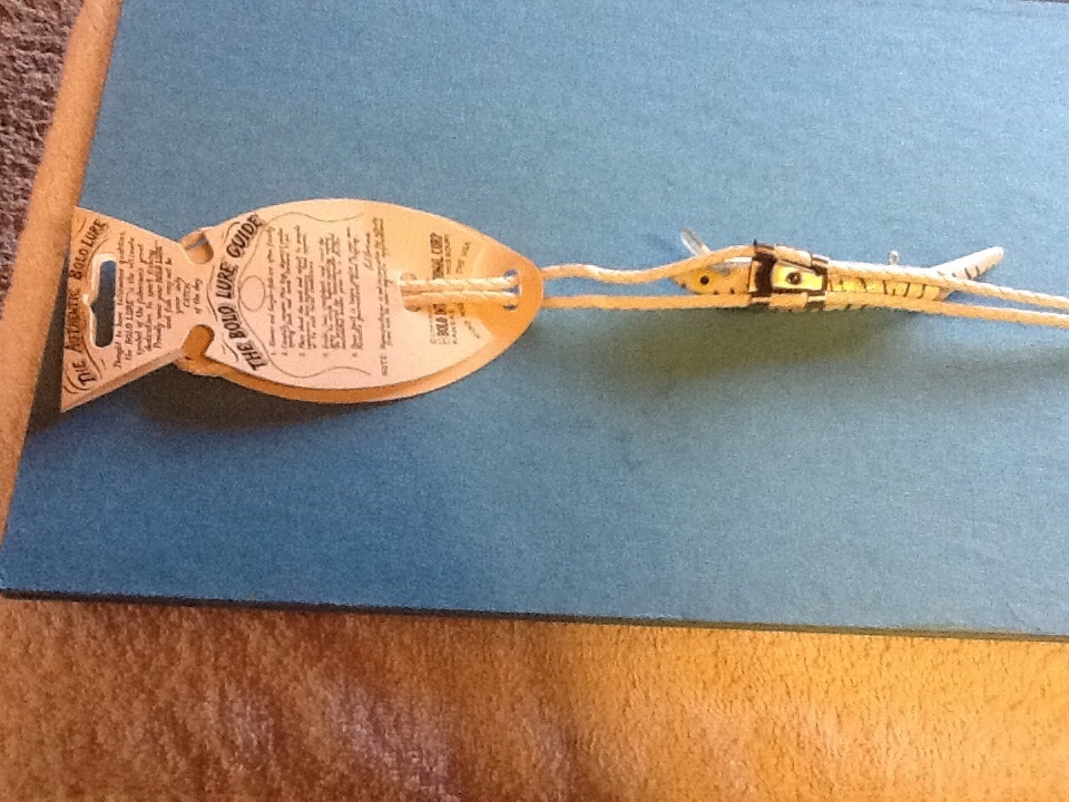 Vintage Bolo Tie featuring A Fishing Lure Embedded In Plastic Cord by Ed Evans