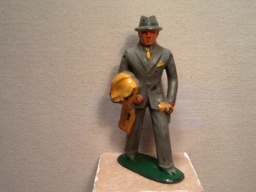 Vintage Barclay lead man in gray suit. 3