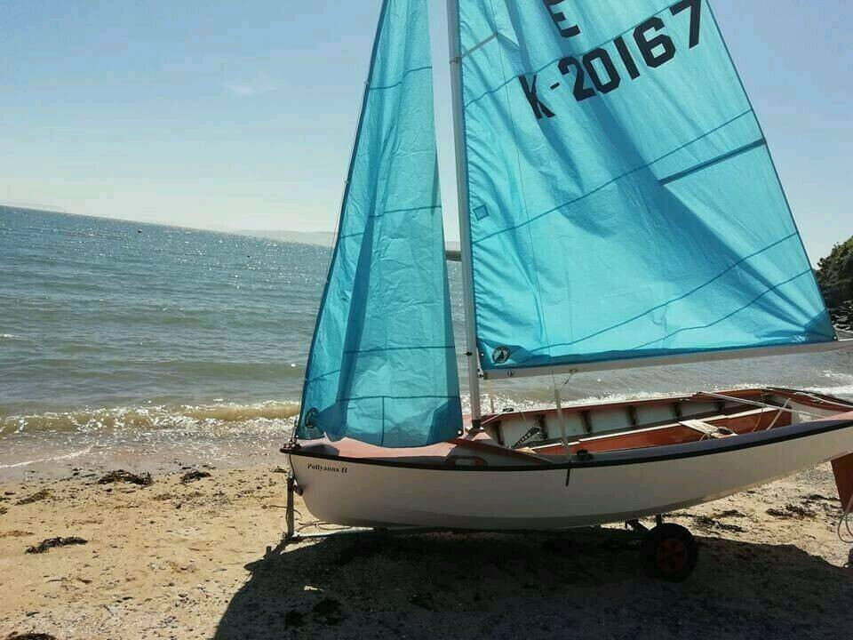 Enterprise sailing dinghy with cover, launch trolley and road trailer