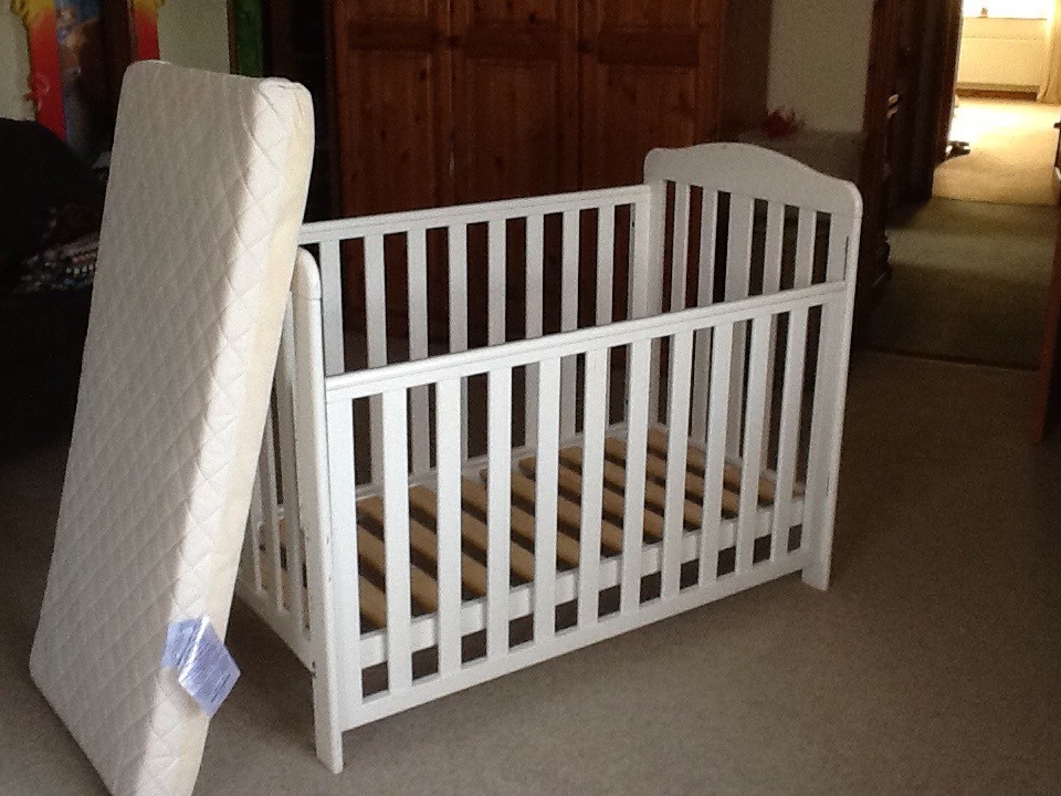 Babies R us cot . White 3postion height adjustment. Drop side rails
