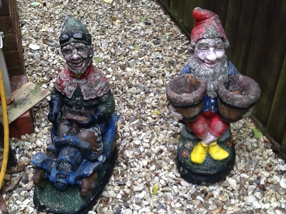 Two garden gnomes solid concrete and very heavy in need of painting