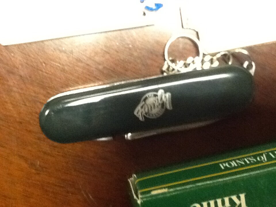 Pair of vintage Golf instructor pocket books and a golfers knife new in box