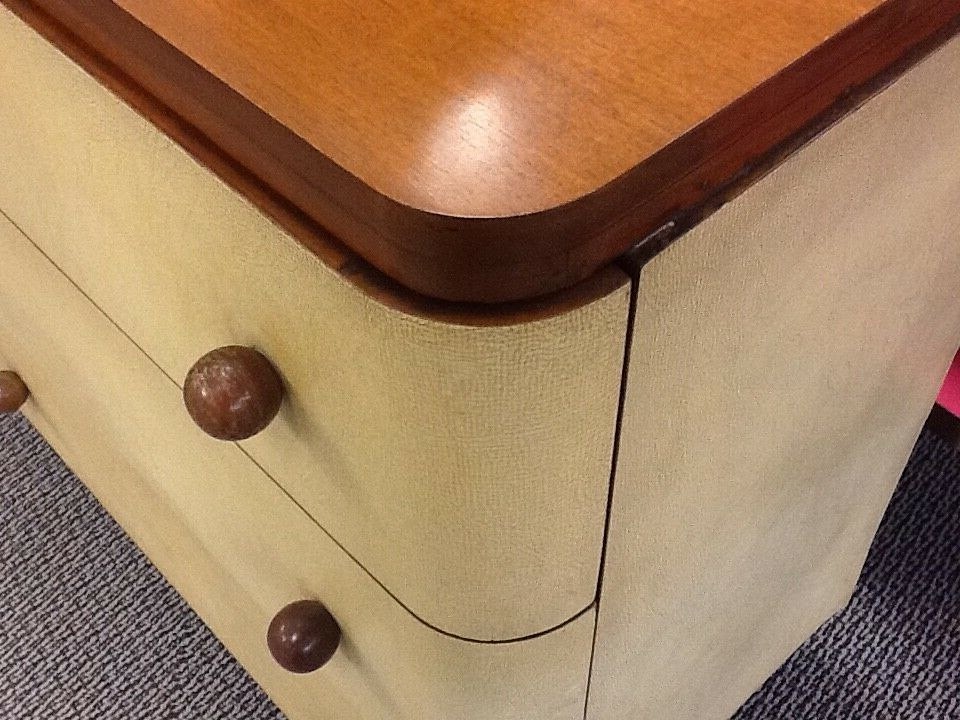 TWO 1938 ART DECO ASYMMETRICAL WALNUT CABINET WITH PARCHMENT FACINGS