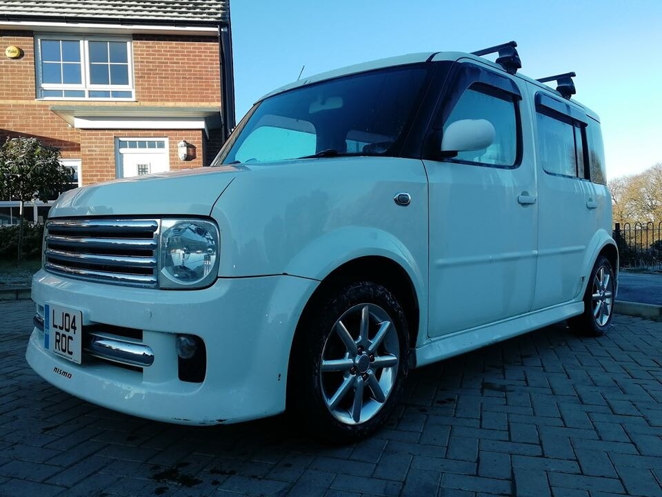 Nissan cube 2004 год