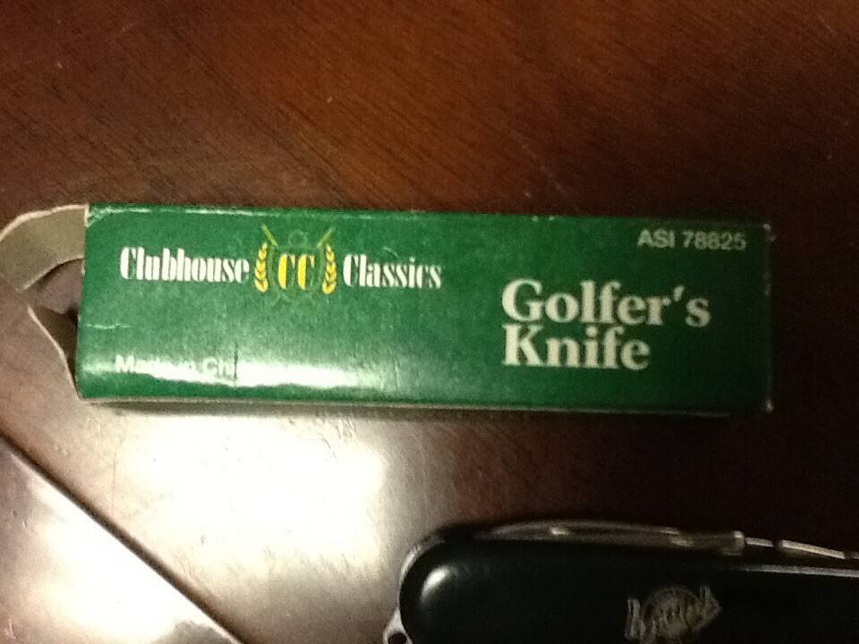 Pair of vintage Golf instructor pocket books and a golfers knife new in box
