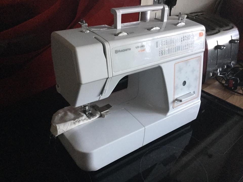 Husqvarna sewing machine with 50 stitches coverwalking foot and all