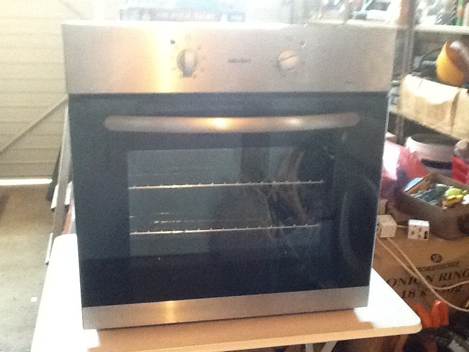 Bush electric single oven fan built in black and steel from Argos AE6BFS in SouthendonSea
