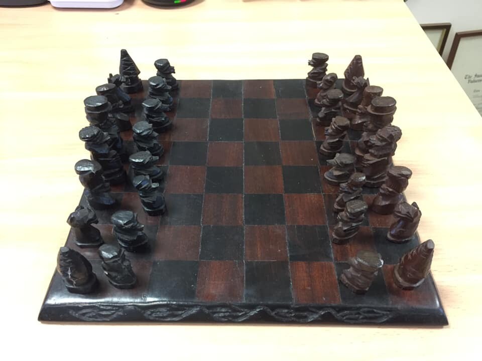 African hand carved wooden chess set in Fordingbridge, Hampshire