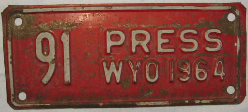 1964 Wyoming Motorcycle Size Press License Plate #91 - Original and Used