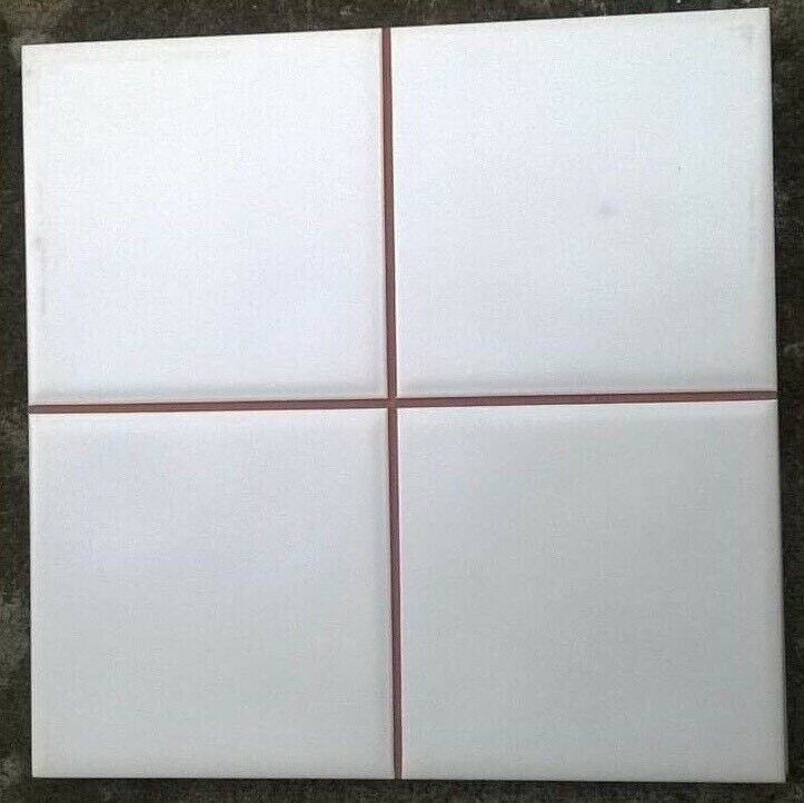 Glazed White Ceramic Tiles With a Cross Design in Southside, Glasgow