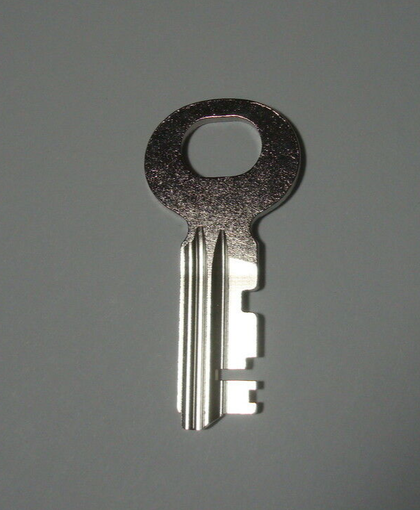 21B  key for Northern Electric 3 slot payphone upper housing 