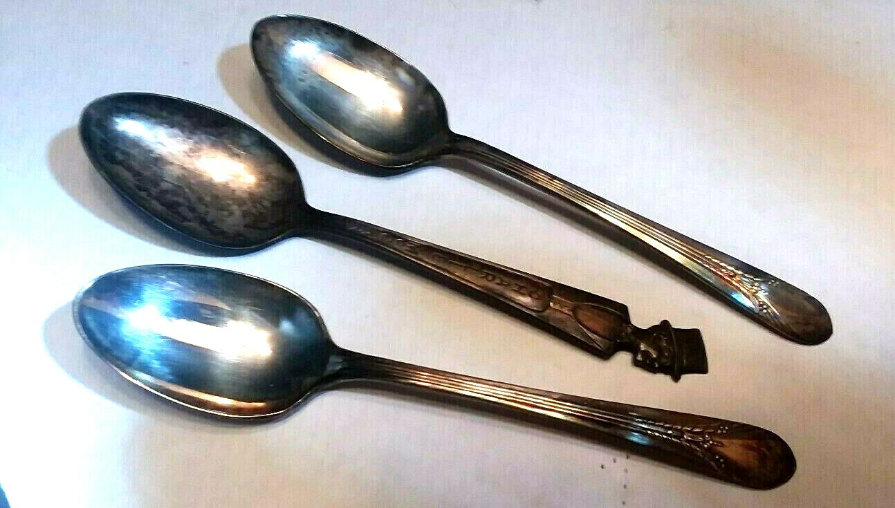 Wm Rogers MFG Co. I S Marked on 3 spoons tarnished or toned BEAUTIES never used
