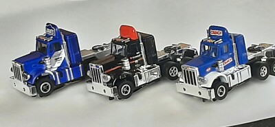 3 NOS Auto World Xtraction Peterbilt Racing Rig Cabs with Chassis HO Slot Car