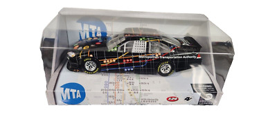 A Lionel   NYC MTA Map Car NASCAR Ford Fusion  New In Box  1/24 Scale