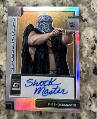 2023 WWE Panini Chronicles THE SHOCKMASTER Optic Holo Prizm Auto SP