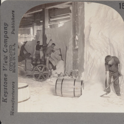PHOTO OF YOUNG MEN SHOVELING LARGE PILES OF SALT FOR SHIPMENT - ST CLAIR, MICH