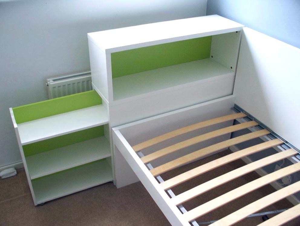 White Ikea Flaxa bed. Trundle style, pull out bed underneath for 2nd