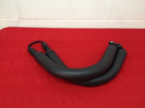 upper body exerciser bungee padded workout equipment  Unmarked as to what it is.